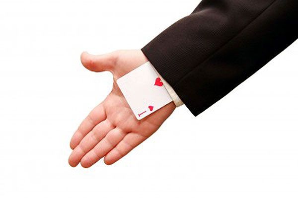 a gambler showing his key to success an ace in sleeve